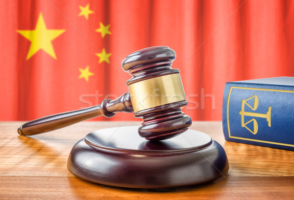 A gavel and a law book - China Stock photo © Zerbor