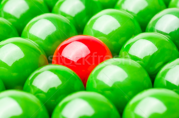 Concept with red and green marbles -  Being different Stock photo © Zerbor