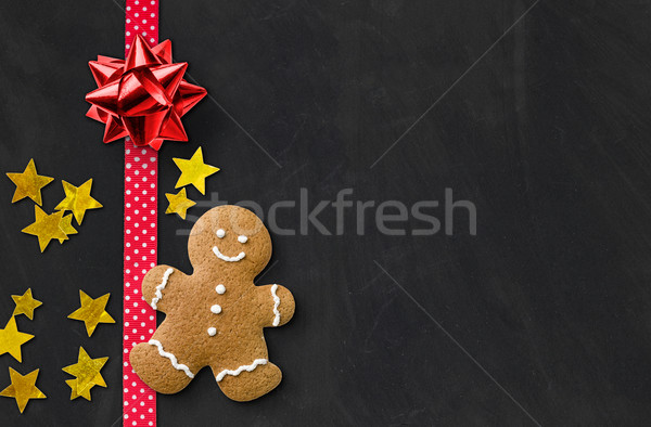 A gingerbread man on a blackboard Stock photo © Zerbor
