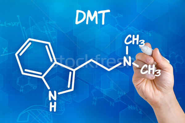 Hand with pen drawing the chemical formula of DMT Stock photo © Zerbor