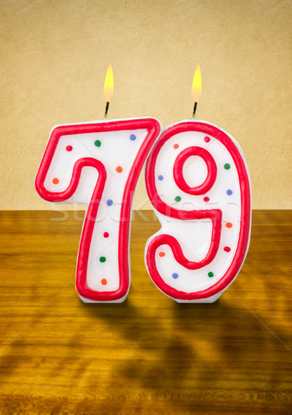 Stock photo: Burning birthday candles number 79