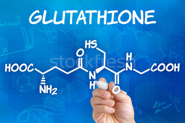 Hand with pen drawing the chemical formula of Glutathione Stock photo © Zerbor