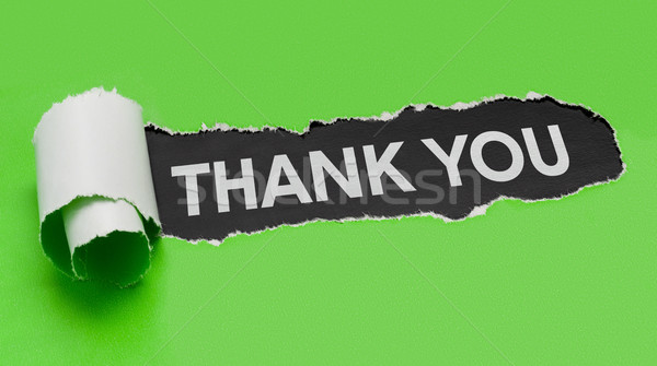 Torn green paper revealing the word Thank you Stock photo © Zerbor