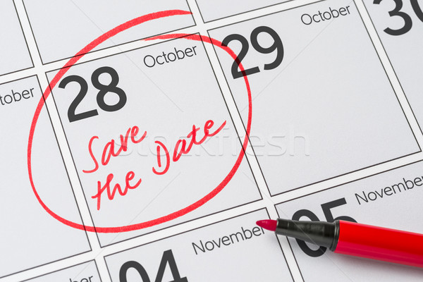 Save the Date written on a calendar - October 28 Stock photo © Zerbor