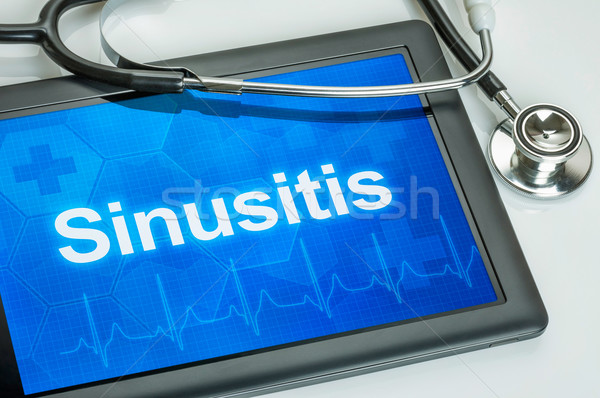 Tablet with the diagnosis Sinusitis on the display Stock photo © Zerbor