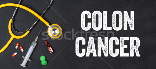 Stethoscope and pharmaceuticals on a blackboard - Colon Cancer Stock photo © Zerbor
