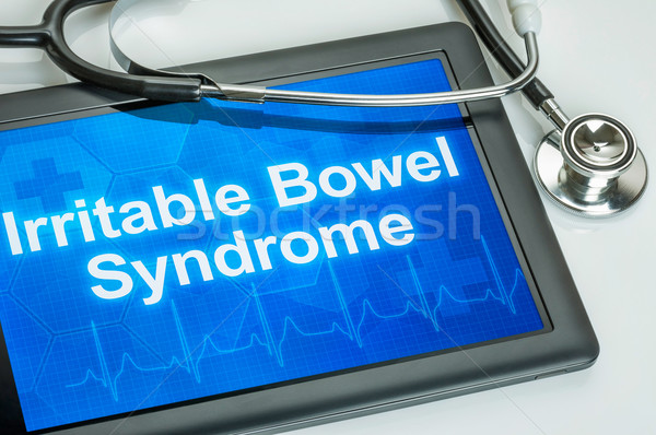 Tablet with the diagnosis Irritable bowel syndrome on the displa Stock photo © Zerbor