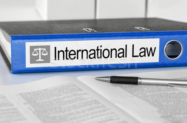 Blue folder with the label International Law Stock photo © Zerbor