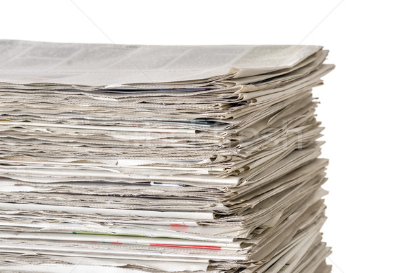Piled newspapers on a white background Stock photo © Zerbor