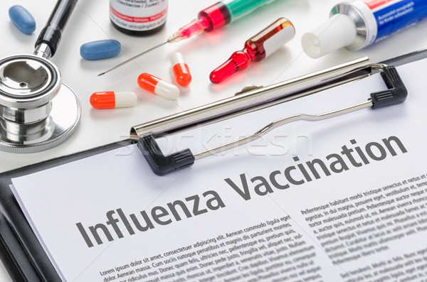 Influenza vacunación escrito portapapeles hospital medicina Foto stock © Zerbor