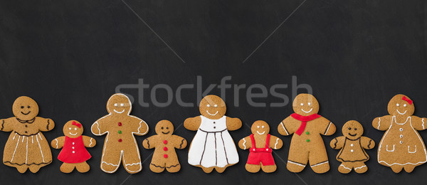 Gingerbread family on a blackboard Stock photo © Zerbor