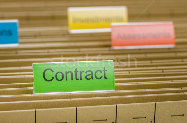 Stock photo: Hanging file folder labeled with Contract