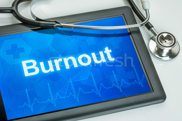 Tablet with the diagnosis burnout on the display Stock photo © Zerbor