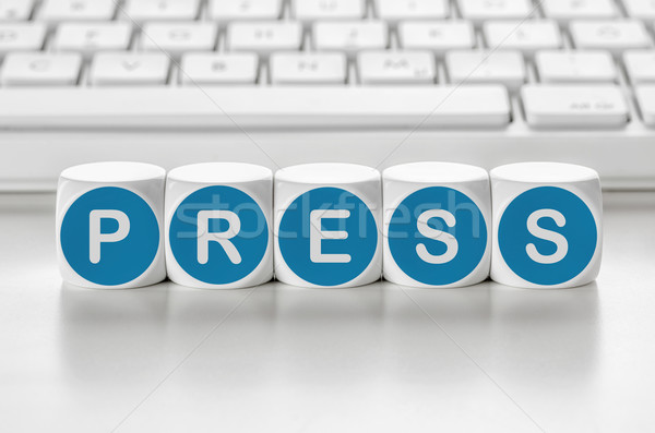 Letter dice in front of a keyboard - Press Stock photo © Zerbor