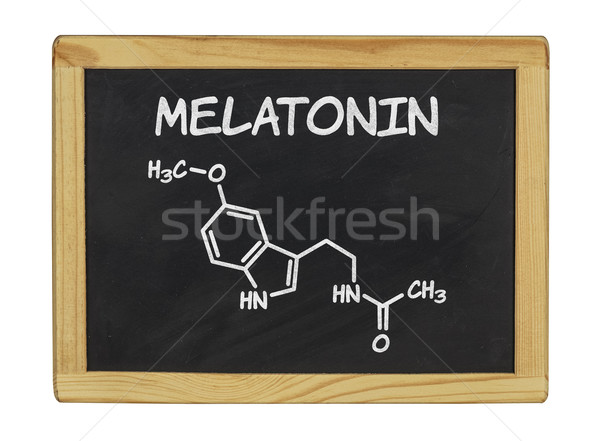 chemical formula of melatonin on a blackboard Stock photo © Zerbor