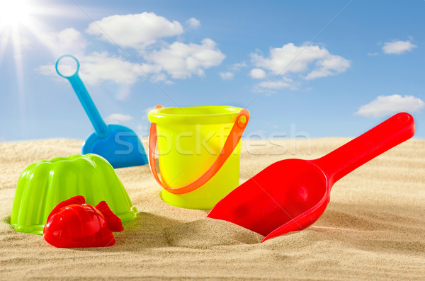 Colourful beach toys for kids in the sand Stock photo © Zerbor