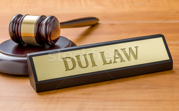 A gavel and a name plate with the engraving DUI Law Stock photo © Zerbor