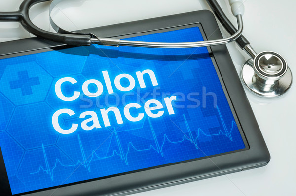 Tablet with the diagnosis colon cancer on the display Stock photo © Zerbor