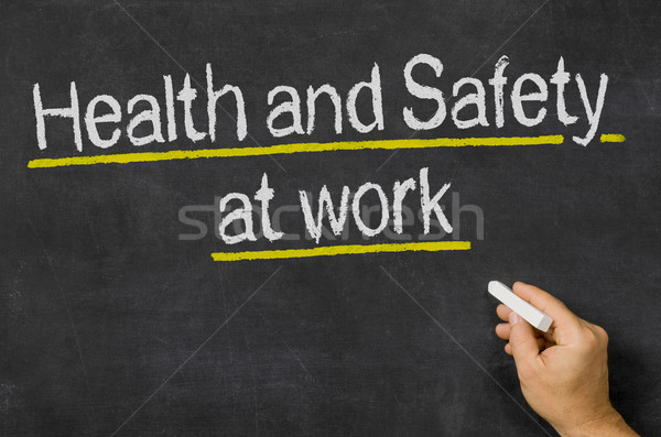 Stock photo: Blackboard with the text Health and Safety at work