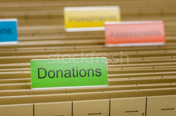 Hanging file folder labeled with Donations Stock photo © Zerbor