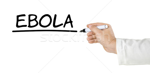 Stock photo: Hand with pen writing the word Ebola