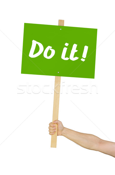 Person holding a sign saying Do it Stock photo © Zerbor