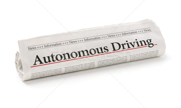 Rolled newspaper with the headline Autonomous Driving Stock photo © Zerbor