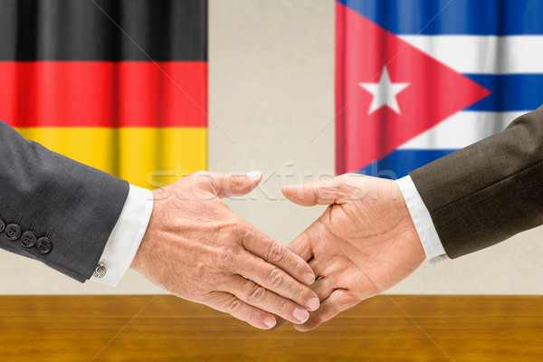 Niemcy Kuba Shake Hands ręce strony spotkanie Zdjęcia stock © Zerbor
