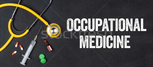 Stethoscope and pharmaceuticals on a blackboard - Occupational M Stock photo © Zerbor