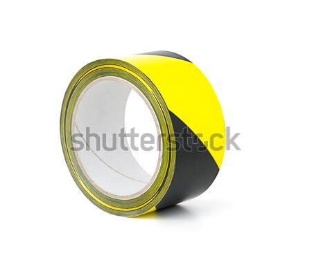 Roll of yellow and black caution tape Stock photo © Zerbor