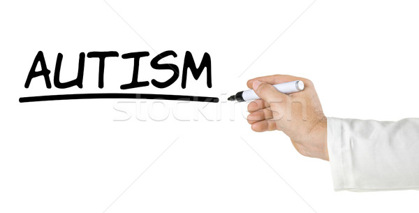 Hand with pen writing Autism Stock photo © Zerbor