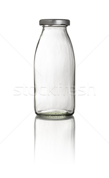 Empty milk bottle on a white background Stock photo © Zerbor