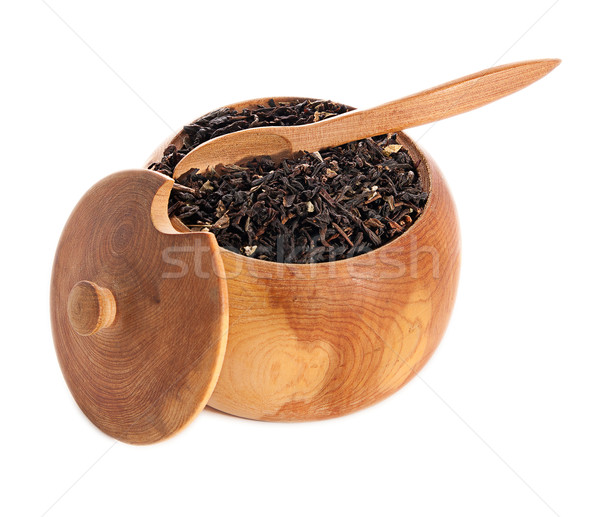 black tea leaves on wooden ware  isolated on white background Stock photo © Zhukow