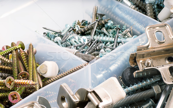 Boîte métal écrou vis clou Photo stock © Zhukow