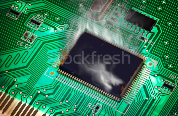 The Green PCB on the lighting. steamy from overheating Stock photo © Zhukow