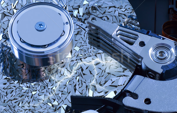 Hard disk detail with  surface splinters Stock photo © Zhukow