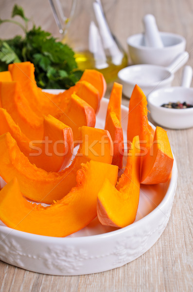 Raw slices of pumpkin Stock photo © zia_shusha