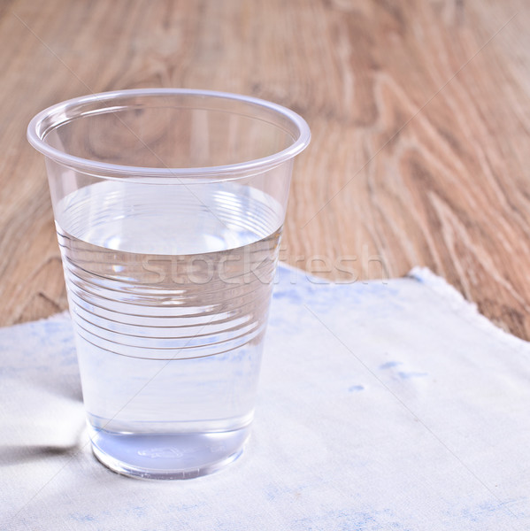Transparent liquid in a plastic Cup Stock photo © zia_shusha