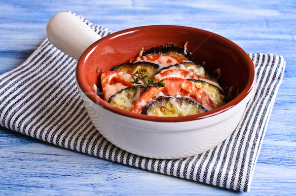 Casserole of eggplant and tomato with cheese Stock photo © zia_shusha
