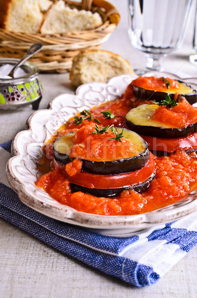 Baked eggplant with tomato and cheese Stock photo © zia_shusha