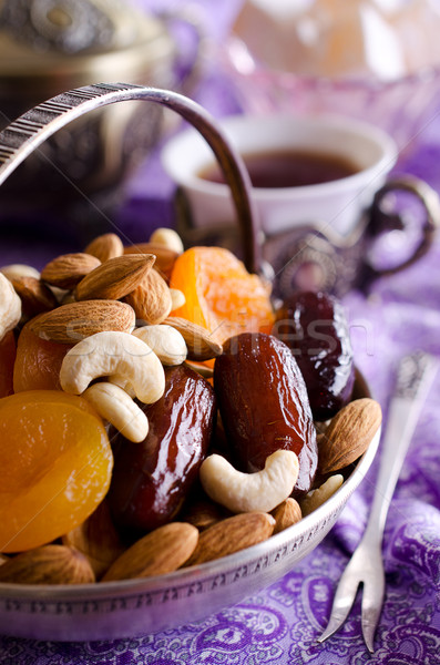 almonds, dried apricots, cashews, dates, lying in a metal bowl  Stock photo © zia_shusha