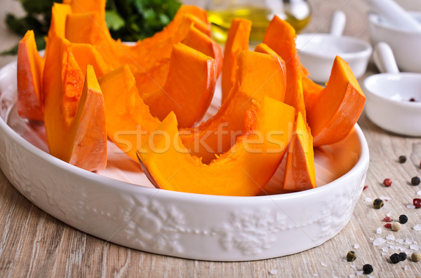 Raw slices of pumpkin Stock photo © zia_shusha