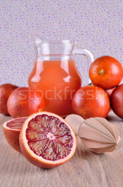 Vermelho laranja cortar comida madeira suco Foto stock © zia_shusha