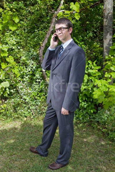 Uomo telefono felice imprenditore outdoor parlando Foto d'archivio © zittto