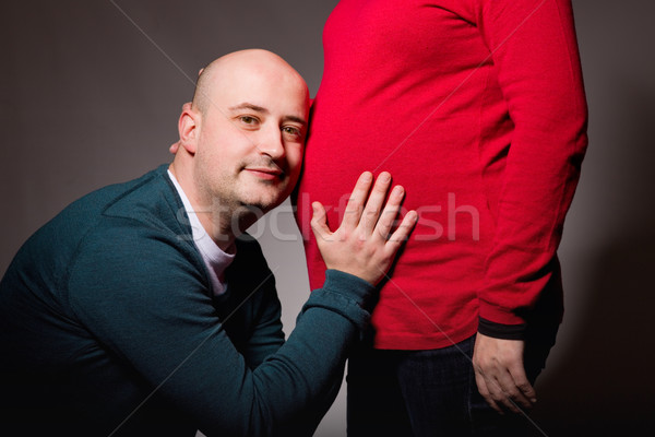 Сток-фото: беременна · пару · счастливым · позируют · темно · семьи