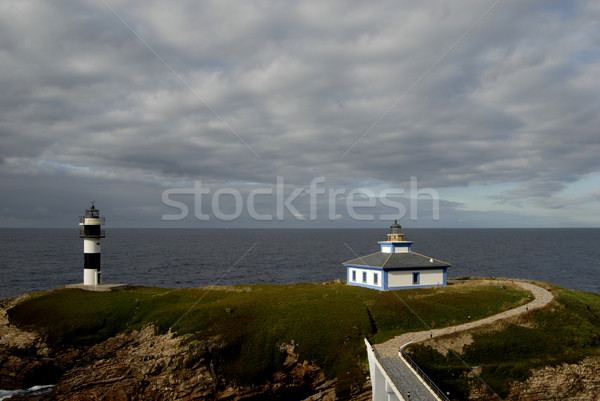 Deniz feneri küçük sahil kuzey İspanya bulutlar Stok fotoğraf © zittto