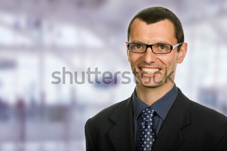Szczęśliwy młodych człowiek biznesu portret biuro twarz Zdjęcia stock © zittto