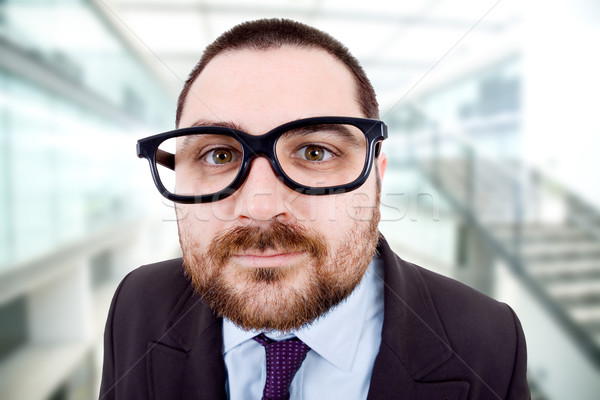 [[stock_photo]]: Stupide · jeunes · homme · d'affaires · portrait · bureau · affaires