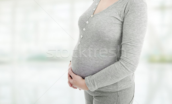 Terhesség közelkép terhes nő fehér test otthon Stock fotó © zittto