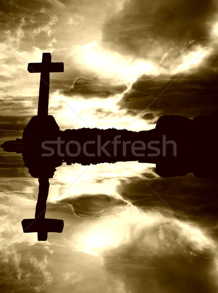 Cross christian nubi acqua riflessione cielo Foto d'archivio © zittto